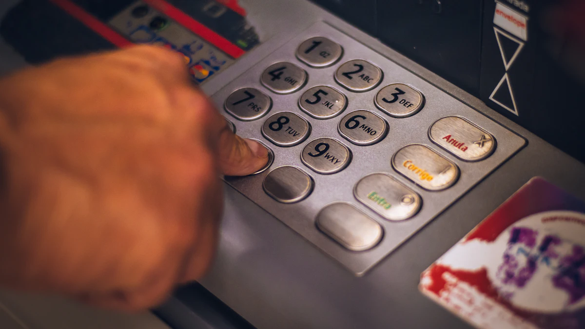 Close view of a person pressing the keypad on an automated teller machine
