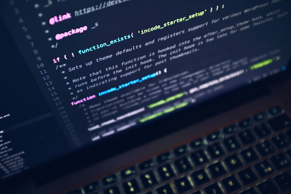 Software code displayed on a laptop during a blockchain security review