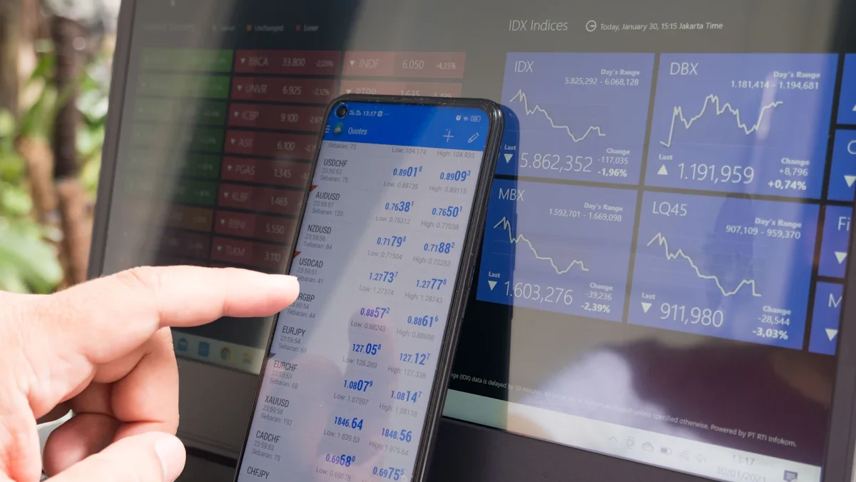 Smartphone and laptop used for digital-asset trading, illustrating Robinhood crypto volume