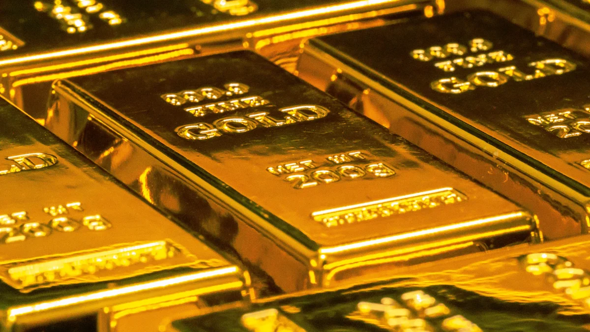 Stacked gold bars representing physical bullion behind tokenised ownership
